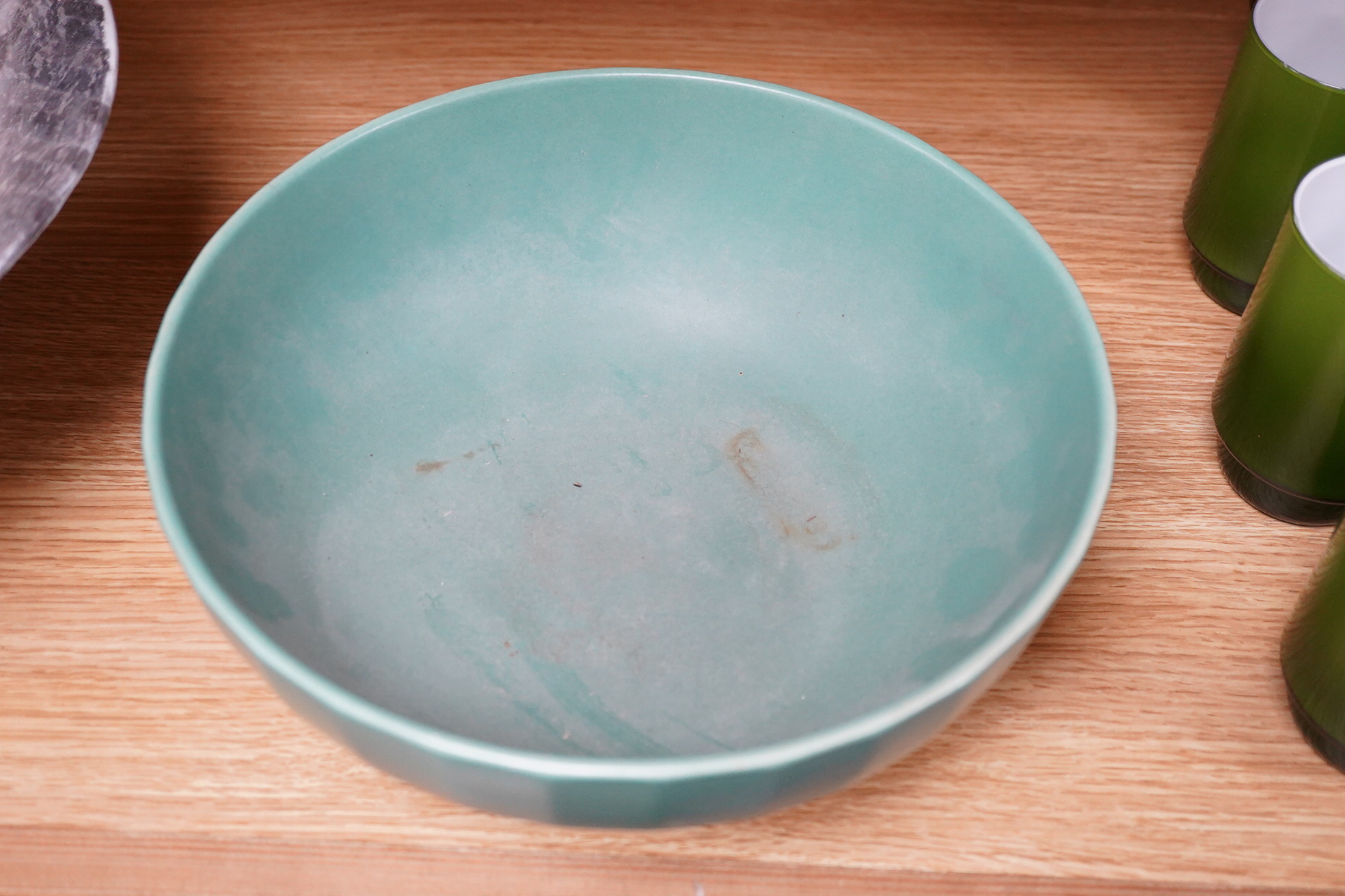 Keith Murray for Wedgwood, a green glazed centre bowl, 24cm in diameter